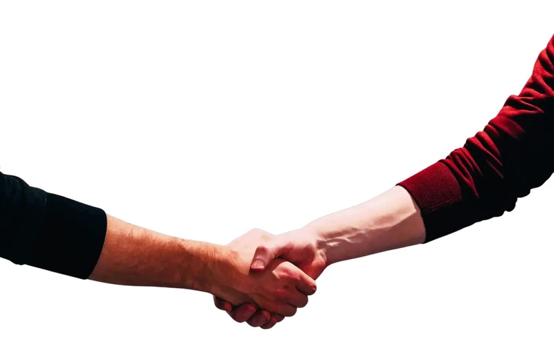 A handshake — the plain promise that begins every Southern Garage Doors job