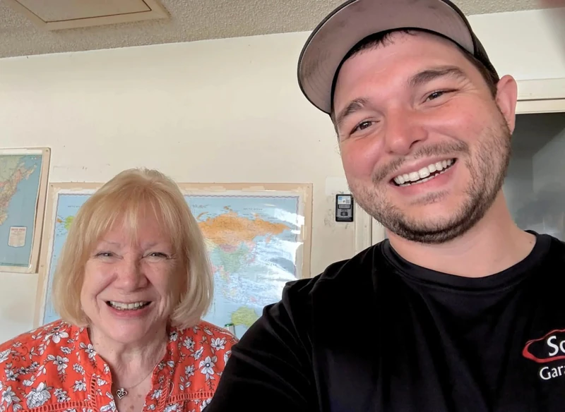 Matthew Knepp and his mother in the Southern Garage Doors office