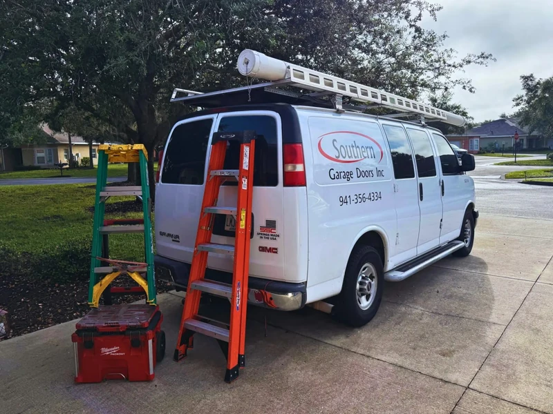 Van + ladders — equipment handled with wisdom and care